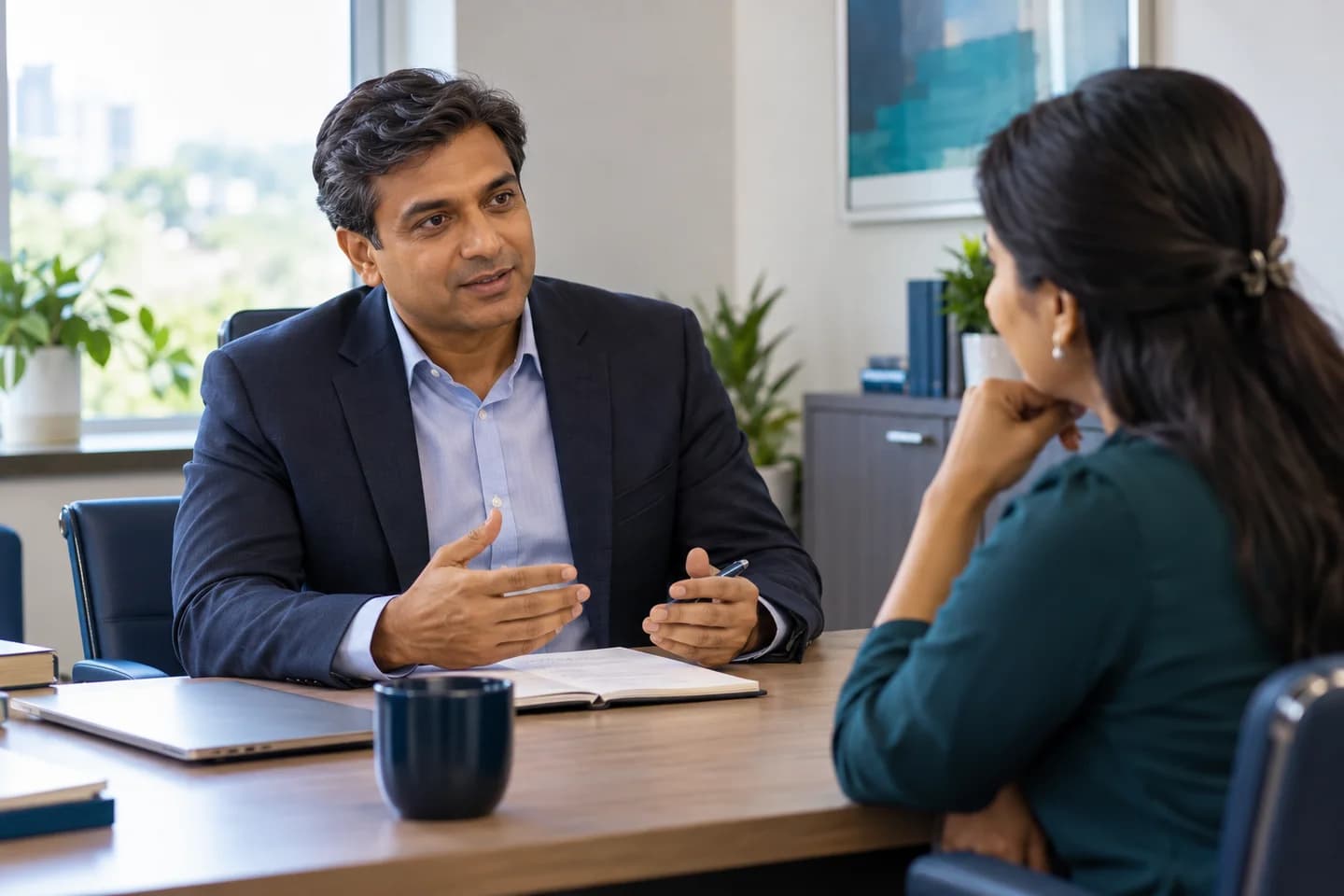 Illustrative scene: Practice owner discussing leadership decisions with a business coach