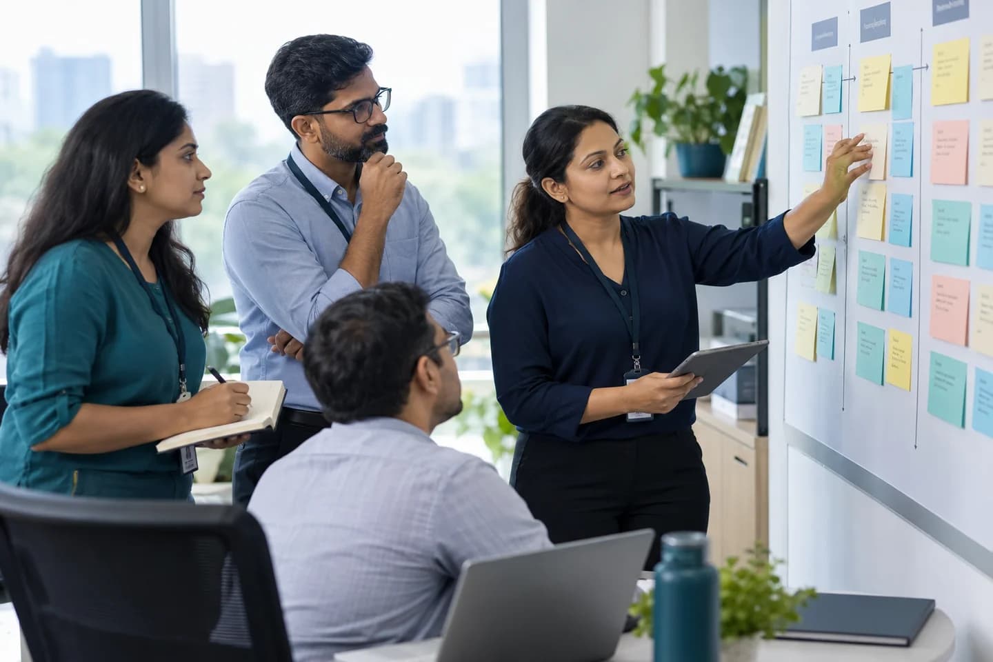 Illustrative scene: Administrative team planning phased workflow changes