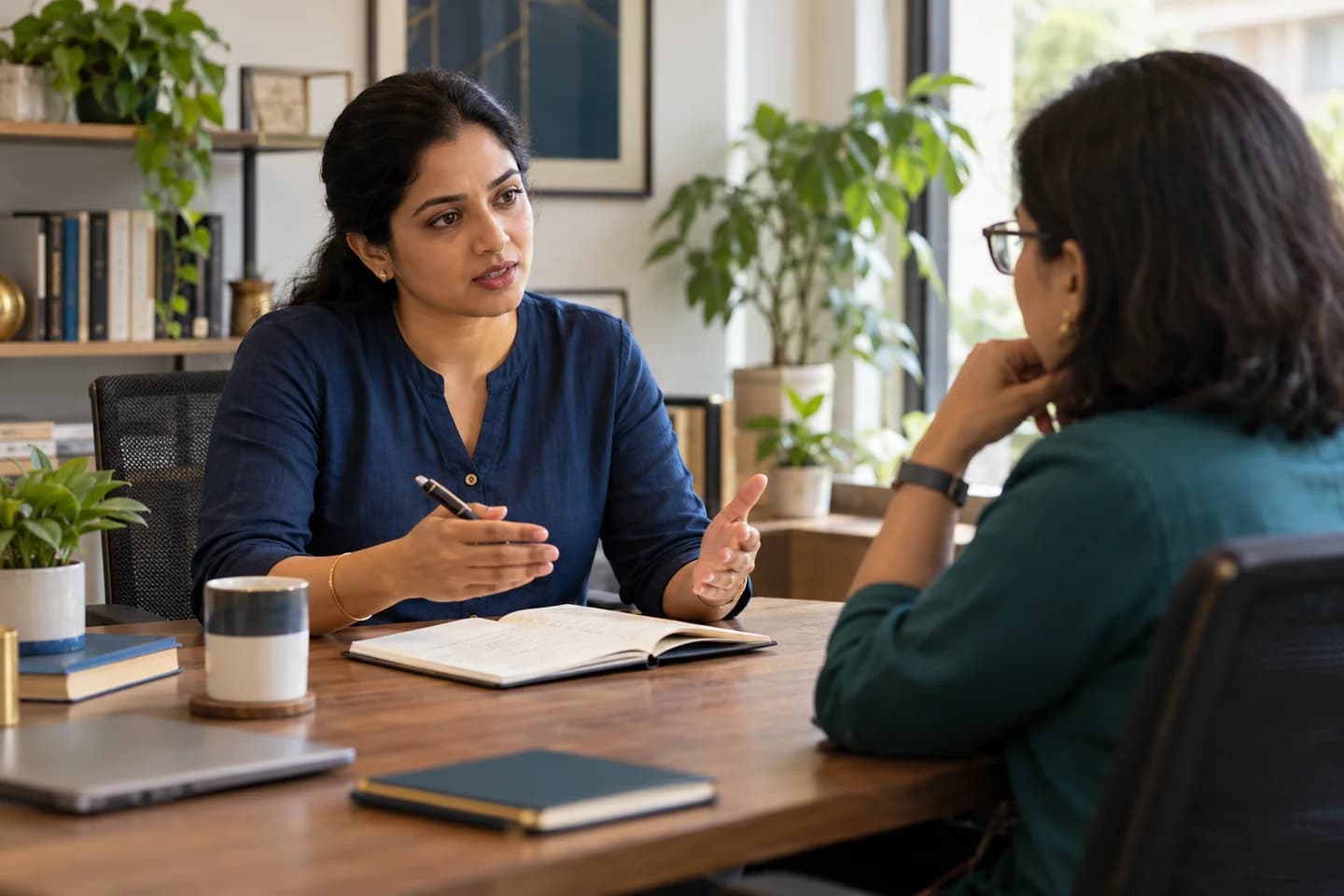Illustrative scene: Business owner discussing a decision with a coach