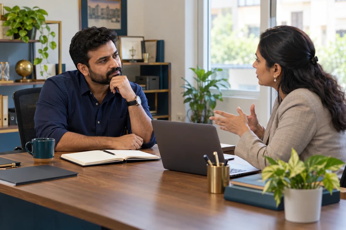 Illustrative scene: Business owner discussing the approach with a prospective coach